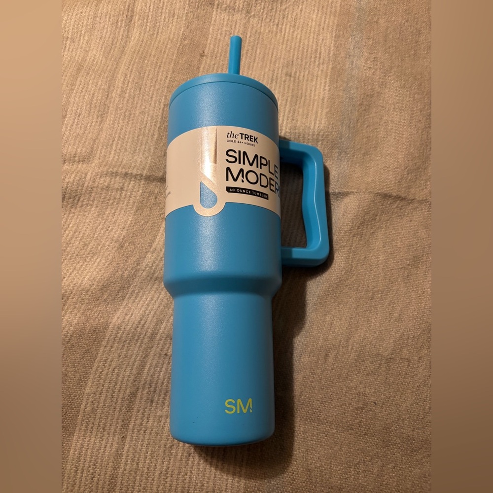 Simple Modern NWT 40 oz Trek Tumbler in a light blue color stainless steel